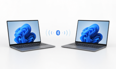 Two Windows 11 laptops connected by a Bluetooth PAN link on a white background.